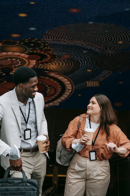 A group of diverse people looking happy and relaxed indoors.